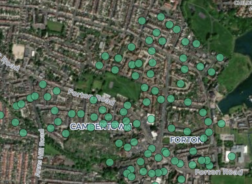 Satellite view of the same estate with the same eligible-property dots